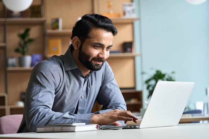 man browsing online for nonprofits