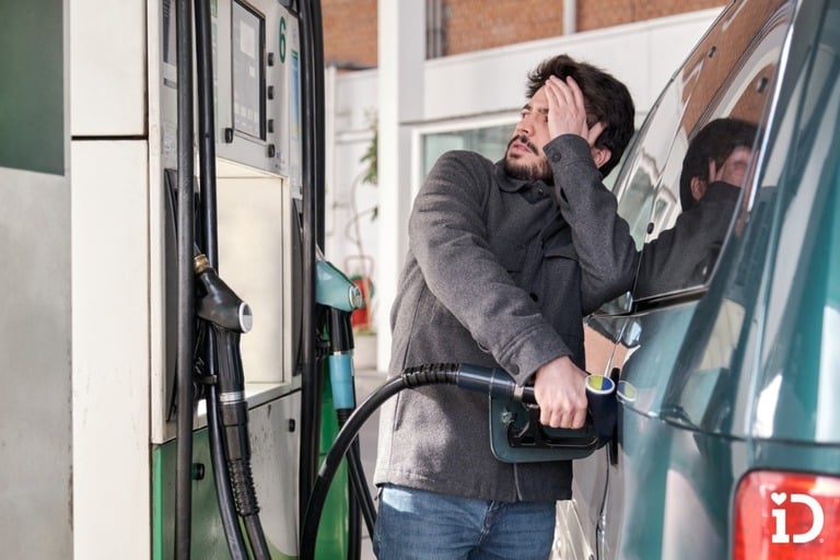 man looking worried about high gas prices